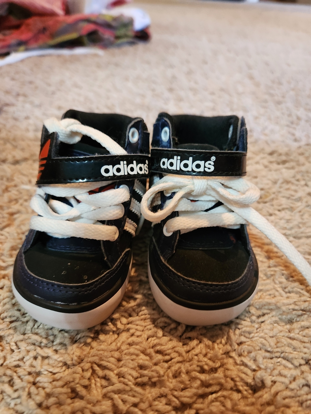 adidas Kids Black and White High-Top Sneakers with Orange Accent